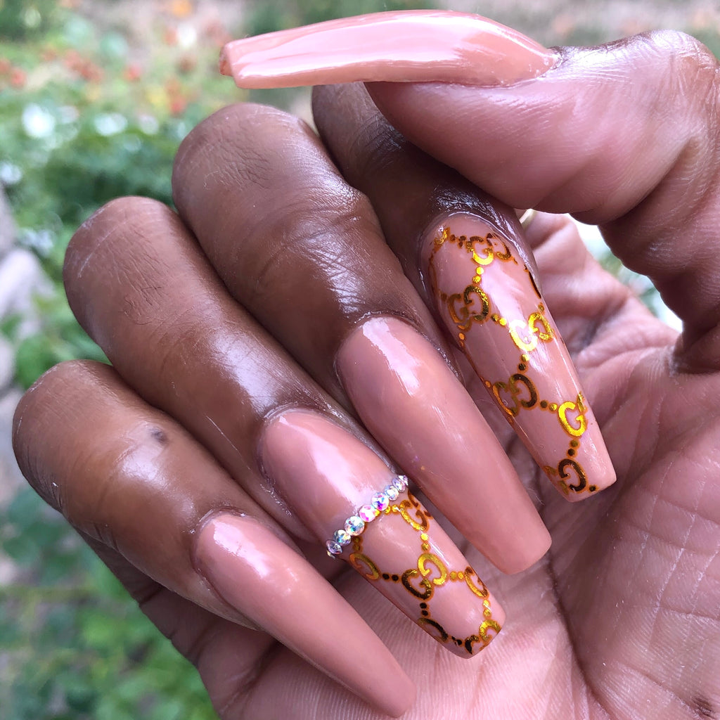 Gucci coffin nails with nude brown gel nail polish. Foil gel polish. Diamond nails. Coffin shaped nails.