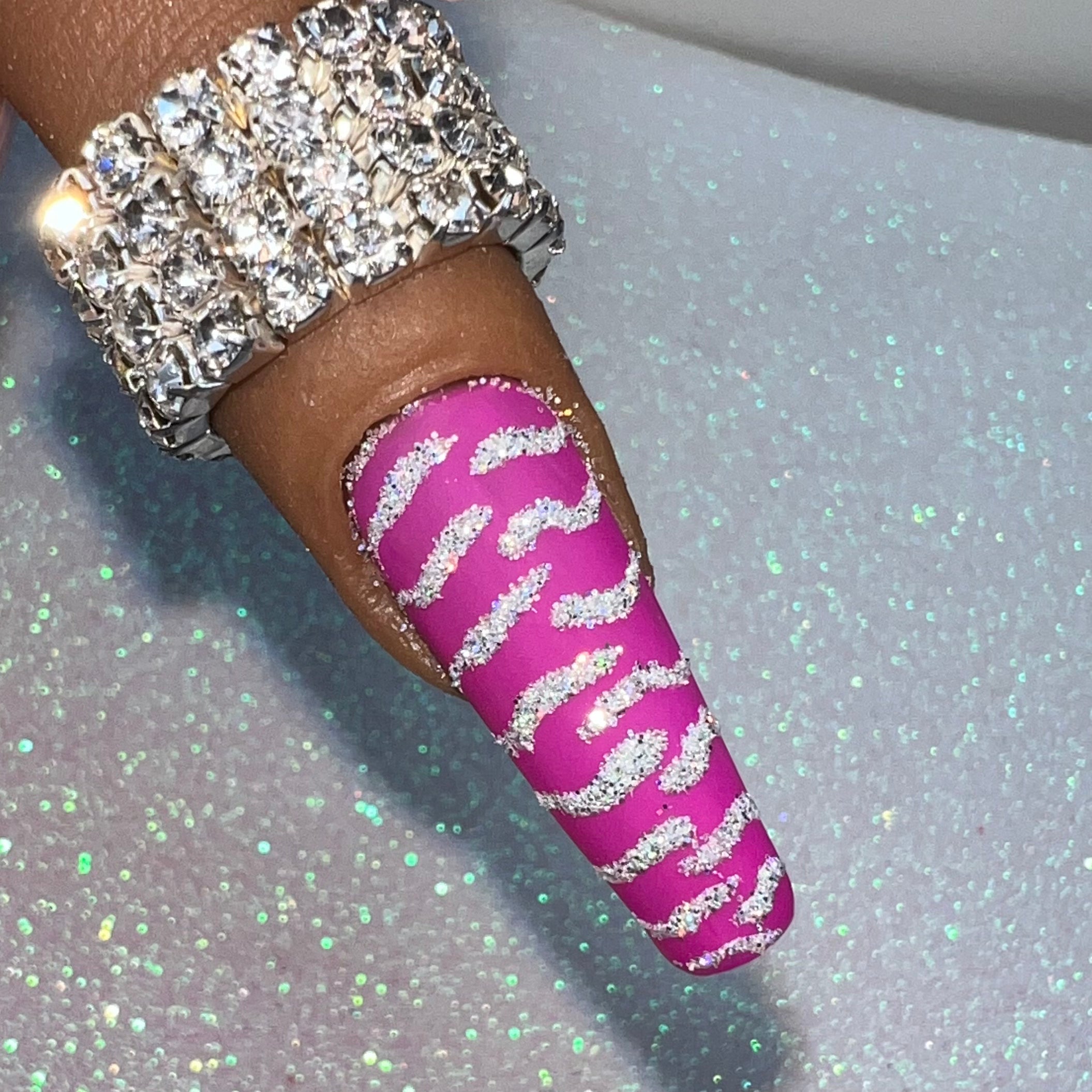 fuschia pink and purple. Matte nail