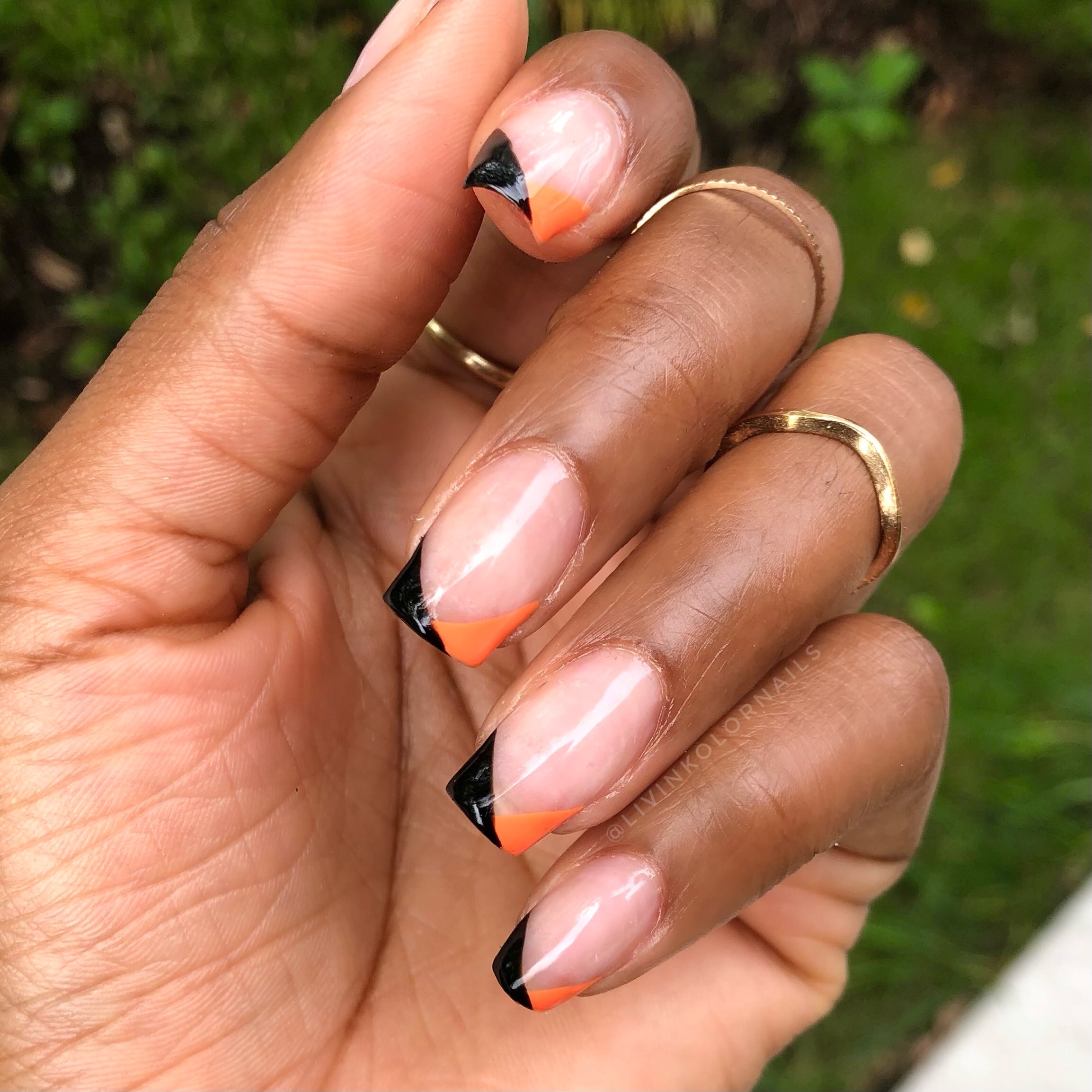 gel polish on natural nails. French tips. Color- Black and Orange for Halloween. Square shaped.