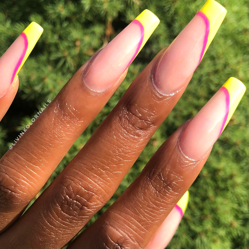 Beautiful neon lime gel polish on black woman's nails. Color - neon lime.