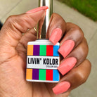 corel gel nail polish on natural nails. Black woman. square shaped nails.