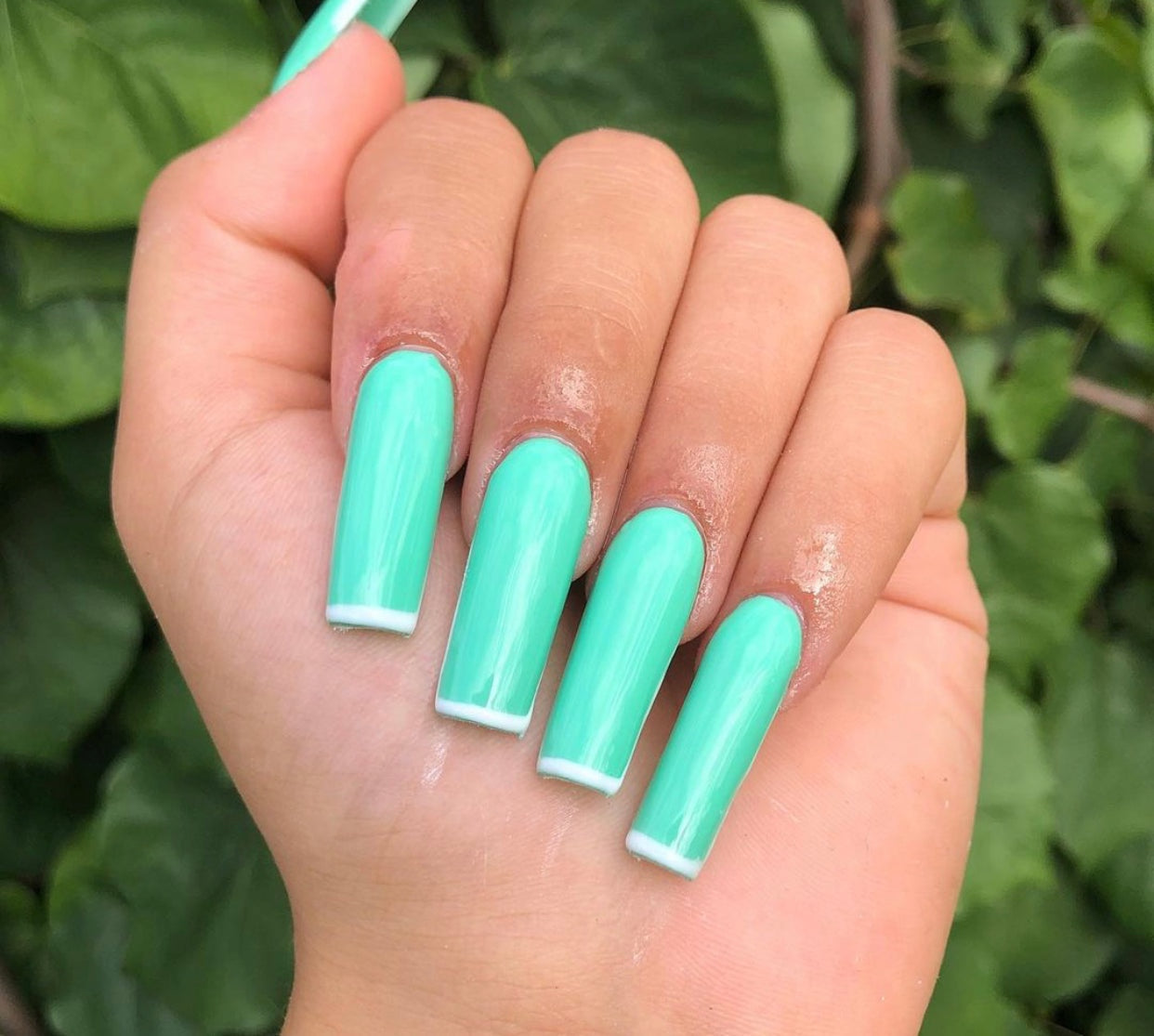 light green mint gel nails polish with white french tips- squared shape